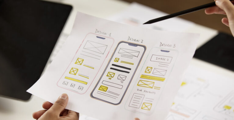 high-angle-hands-holding-paper